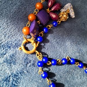 Long Blue Beaded Necklace with Charms